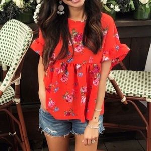 Floral top with ruffle sleeve